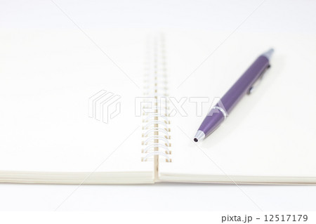 Pen and spiral notebook isolated on white background 12517179
