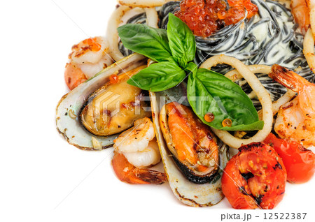 Black Pasta with sea food and basil 12522387