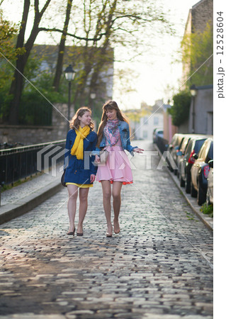 Girls walking together and chatting 12528604