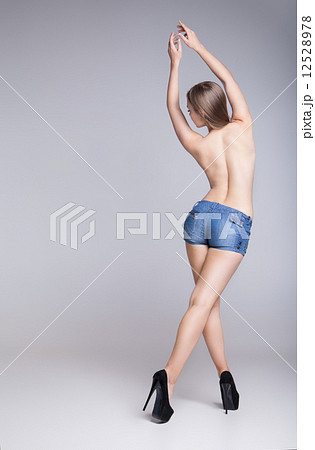 Rear view of sexy woman in jean shorts Rear view of sexy woman in jean shorts 12528978