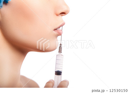 Cosmetic injection to the pretty woman face Cosmetic injection to the pretty woman face 12530150