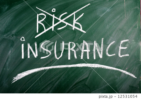 insurance risk crossed out green blackboard  12531054