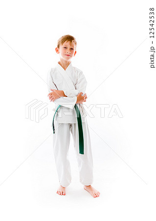 model isolated on plain background happy smiling arms crossed 12542538