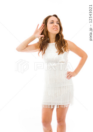 model isolated on plain background listening paying attention 12543021
