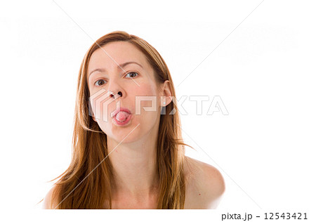 model isolated on plain background face sticking tongue out 12543421