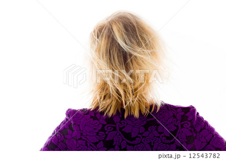 model isolated on plain background back hands on hips 12543782