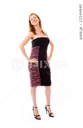 model isolated on plain background pround confident hands on hip 12544840