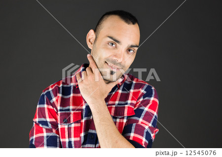 model isolated on plain background thinking 12545076