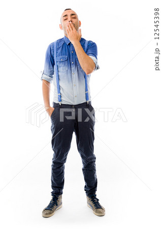 model isolated on plain background tired bored yawning 12545398