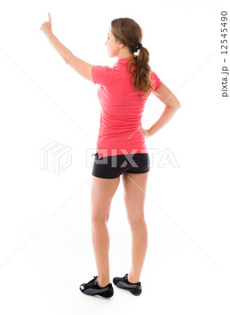 model isolated on plain background back pointing 12545490
