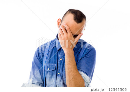 model isolated on plain background ashamed hiding face in hand model isolated on plain background ashamed hiding face in hand 12545506