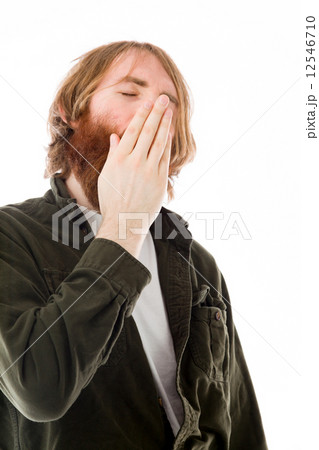 model isolated on plain background tired bored yawning 12546710