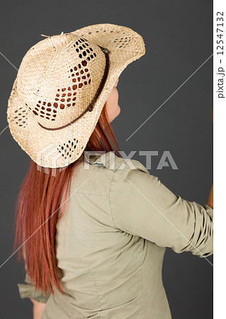 model isolated on plain background back looking behind 12547132