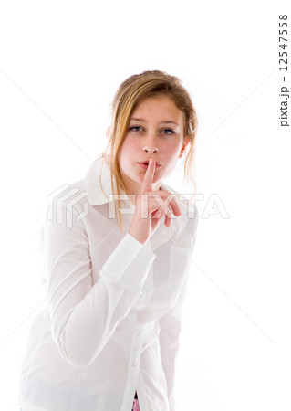 model isolated with finger on lips secret model isolated with finger on lips secret 12547558