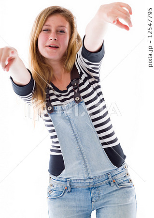 model isolated on plain background fingers pointing to camera 12547795