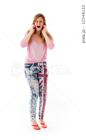 model isolated on plain background plugging ears with fingers 12548132