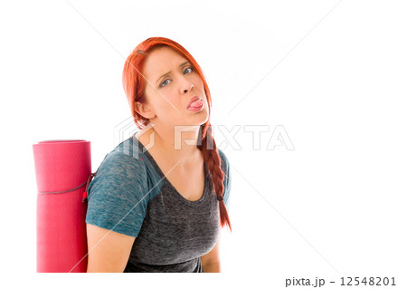 model isolated on plain background face sticking tongue out 12548201
