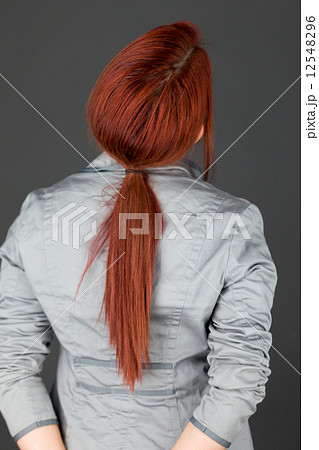 model isolated on plain background back looking behind model isolated on plain background back looking behind 12548296