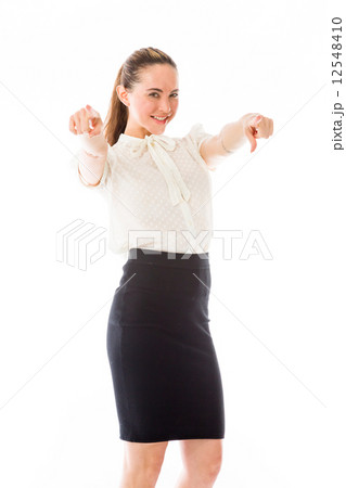 model isolated on plain background fingers pointing to camera 12548410