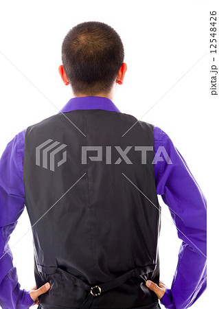model isolated on plain background back hands on hips model isolated on plain background back hands on hips 12548426