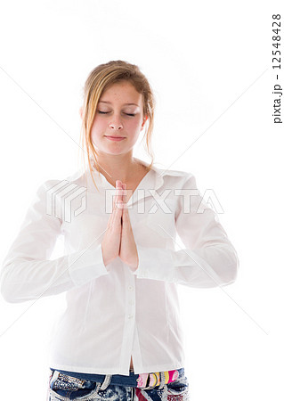 model isolated on plain background praying wishing model isolated on plain background praying wishing 12548428