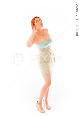 model isolated on plain background listening paying attention model isolated on plain background listening paying attention 12548842