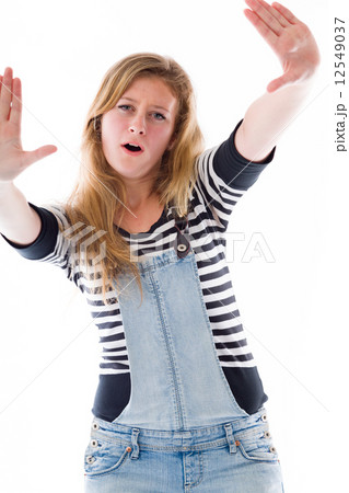 model isolated on plain background stop sign with hands model isolated on plain background stop sign with hands 12549037