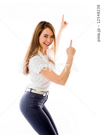 model isolated on plain background looking at camera pointing 12549236