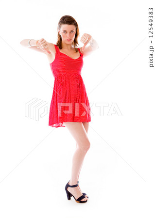 negative model showing thumbs down negative model showing thumbs down 12549383
