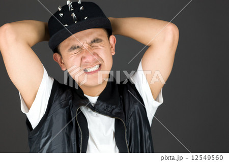 model isolated on plain background stressed upset pulling hairs 12549560