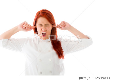 model isolated on plain background plugging ears with fingers model isolated on plain background plugging ears with fingers 12549843