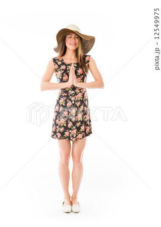 model isolated on plain background praying wishing model isolated on plain background praying wishing 12549975