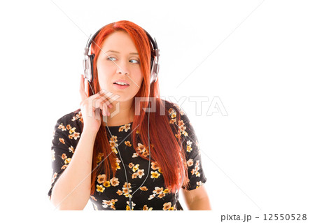 model isolated on plain background listening paying attention 12550528