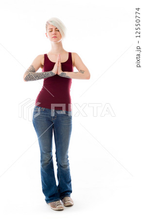 model isolated on plain background praying wishing model isolated on plain background praying wishing 12550774
