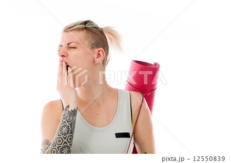 model isolated on plain background tired bored yawning model isolated on plain background tired bored yawning 12550839