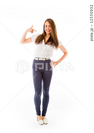 model isolated on plain background pointing to herself 12550932