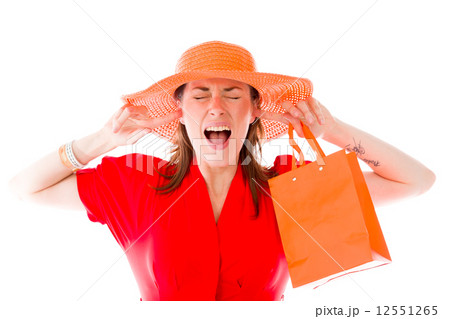 model isolated on plain background plugging ears with fingers 12551265