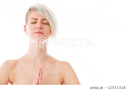 model isolated on plain background praying wishing model isolated on plain background praying wishing 12551316