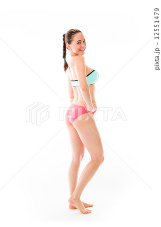 model isolated on plain background back turning around 12551479