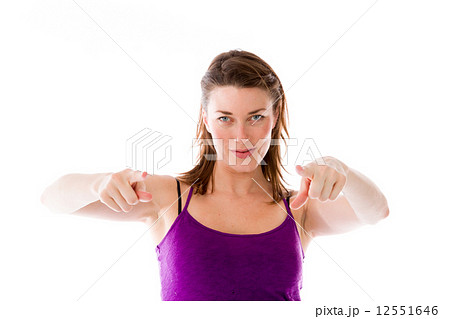 model isolated on plain background fingers pointing to camera 12551646