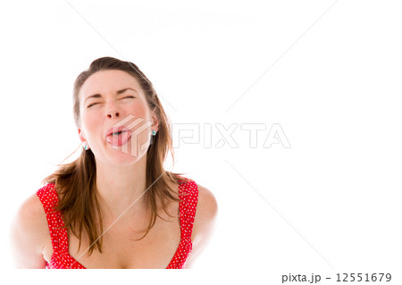 model isolated on plain background face sticking tongue out 12551679