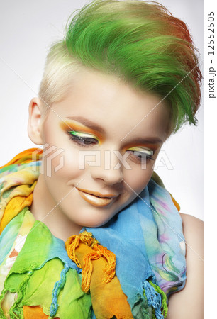 Young Woman with Colorful Makeup and Short Painted Coiffure Young Woman with Colorful Makeup and Short Painted Coiffure 12552505