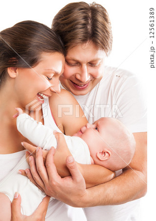 Happy family with the kid over white background 12561389