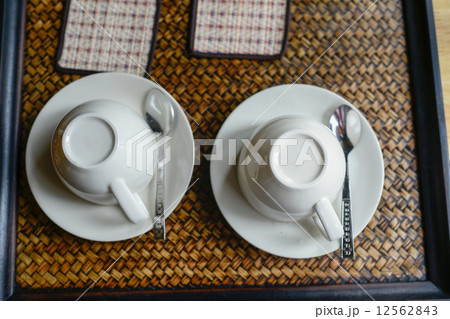 Couple coffee cups set on tray. 12562843