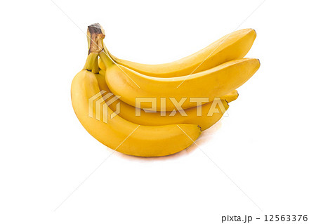 Ripe bananas on a white.  12563376