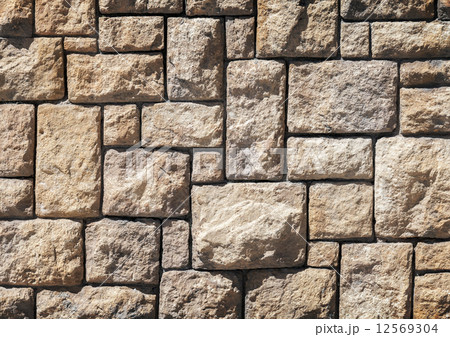 Background texture of old brown decorative stone wall Background texture of old brown decorative stone wall 12569304