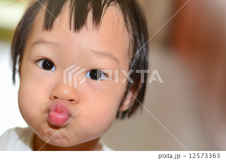 Cute Asian girl, headshot. Cute Asian girl, headshot. 12573363