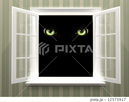 Eyes of monster  in open window 12573917