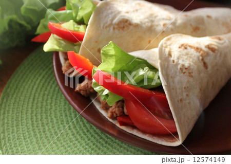 tortilla wraps with meat and vegetables 12574149