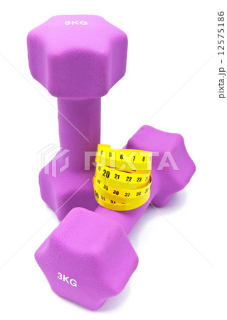 Measuring tape and and Pink dumbbells in a neoprene cover Measuring tape and and Pink dumbbells in a neoprene cover 12575186